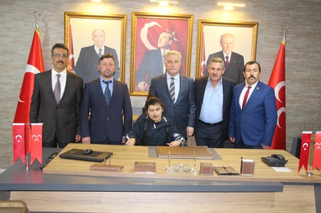 MHP ilçe başkanlığında yüzler gülüyor…